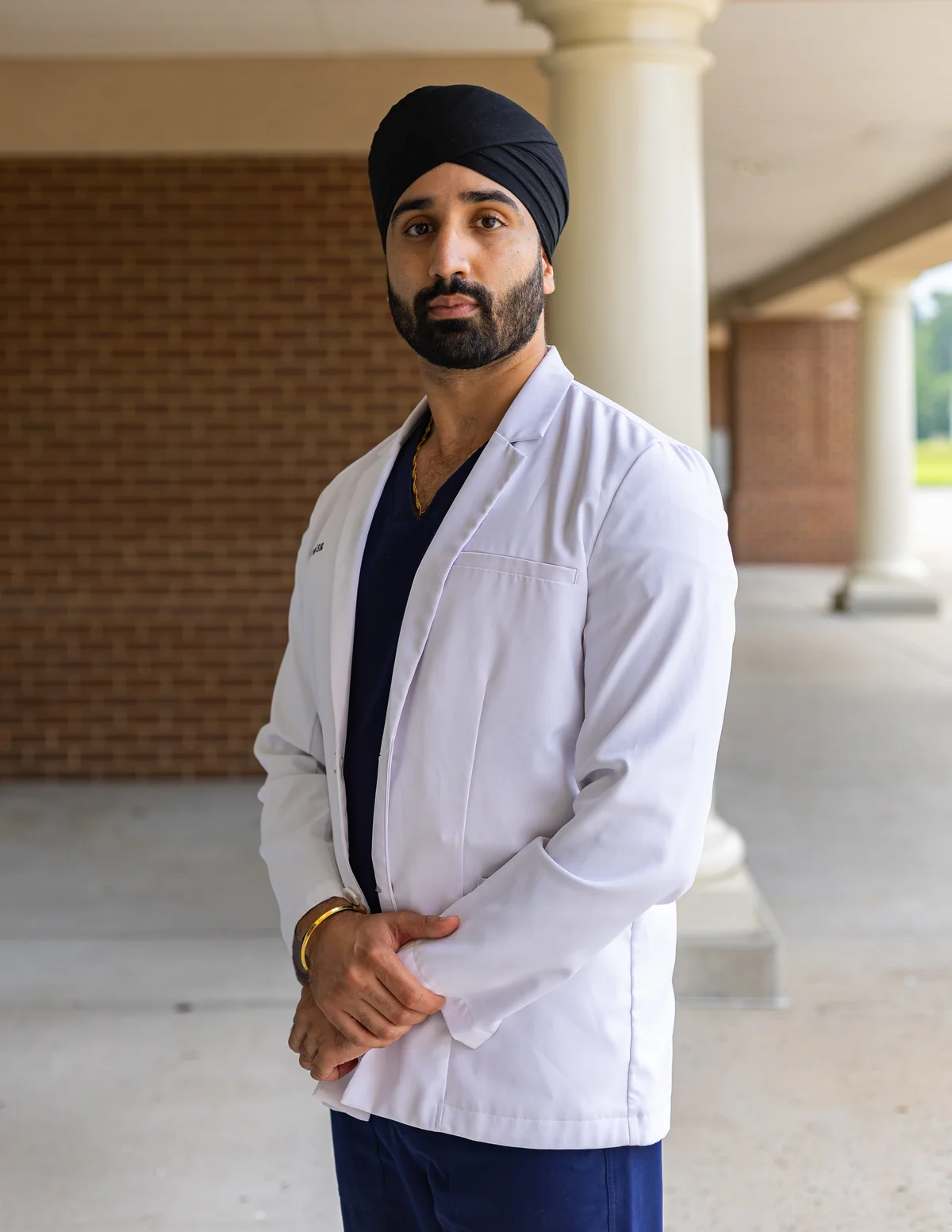 Dr. Manraj Bhangra, DMD, outside Hanover Dental Care